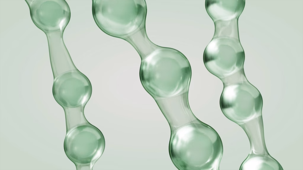 Abstract render of linked spheres representing a chain of amino acids